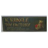 'K. KRINGLE TOY FACTORY NORTH POLE ELF LABOR