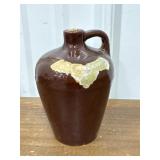 Stoneware jug still full (It says Honey)