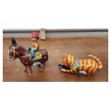 Two tin wind-up toys