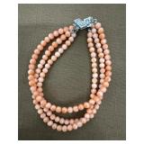 Angel skin coral bracelet signed 14kt