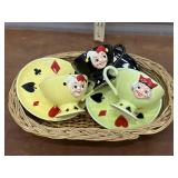 Kreiss & Co. Cup and saucers in basket