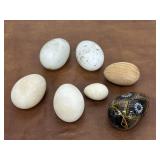 Darning eggs, stone eggs and wooden eggs