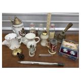 Shaving mugs, brass bell, steins, table lighter