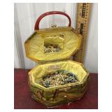 Jewelry carrier with mostly costume jewelry