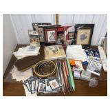 Cross stitch patterns, embroidery hoops, knitting
