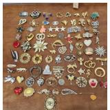 Costume jewelry brooches pins etc