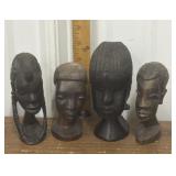 Carved wood tribal busts