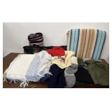 Blankets, socks (some wool), hats, seat cushion