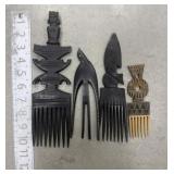 Carved wood tribal combs