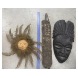 Wall decor- carved wood, clay & feathers