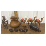 Carved wood camels, rhinoceros, figure etc