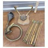 Old deer horns mount, gun cleaning rods, brass