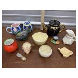 Redware teapot, cat handle creamer, cream and