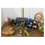 Trucks, cars, dinosaurs, baseball glove, dolls