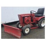 Wheel horse 857 tractor with plow