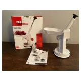 Cherry pitter I. Original box with instructions.