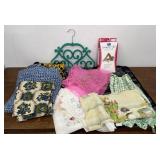 Handkerchiefs, scarves, apron, and mote