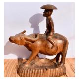 Vintage Carved Man on Water Buffalo Statue