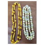 2 Vintage plastic necklaces flower etc