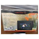 Digital 7" Photo frame, new in box and frames.