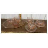 Pink glass plate, cups, saucers