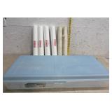 Wall liners and 2 rolls of wallpaper in clear tub