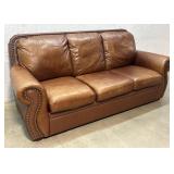 Brown Leather Couch w/ brass buttons - good