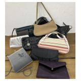 Assorted hand bags. Most in good shape. One a bit