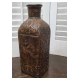 Hand-tooled leather wrapped decanter embossed