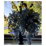 Gorgeous blue vase with flowers
