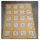 Early baby quilt - red embroidered squares yellow