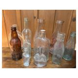 11 Vintage Bottles.
