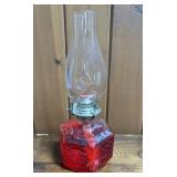 Clear glass oil lamp (oil is red) - no shipping