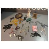 Religious pictures, necklaces, and more.