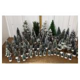 Large group of assorted size bottle brush trees
