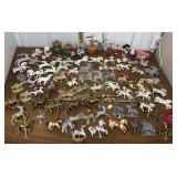 Large group of ornaments- most carousel horses
