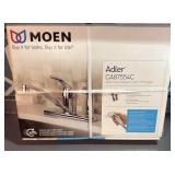 Brand New Moen kitchen faucet with sprayer.