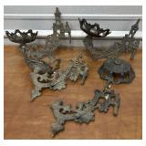 Cast Iron Brackets for oil lamps or plants.