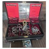 Vintage jewelry box with some contents