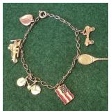 Charm bracelet (the heart is 10k but dented)