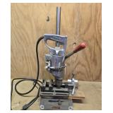 Milwaukee drill press with clamps