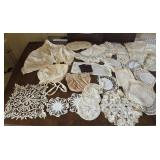 Early doilies, bonnet, cape, etc... the linens