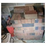 100 plus red bricks bring help to load