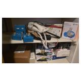 Electronics on two shelves