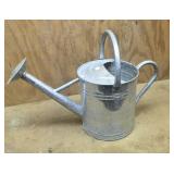 Galvanized water can