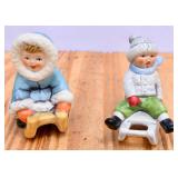 Pair of Goebel Sledding Children Figurines