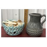 Grey pitcher and bowl of sea shells