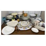 Plates, bowls, mugs, canister, measuring cup,