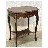 Oval Parlor Table w/ brass trim 28/20/31