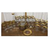 Gold rim glasses, plates, candle holder etc *some